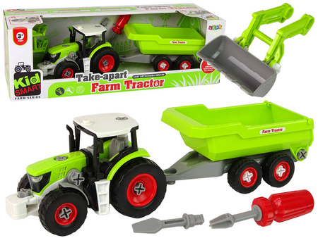 Grüner Traktor mit Sattelauflieger
